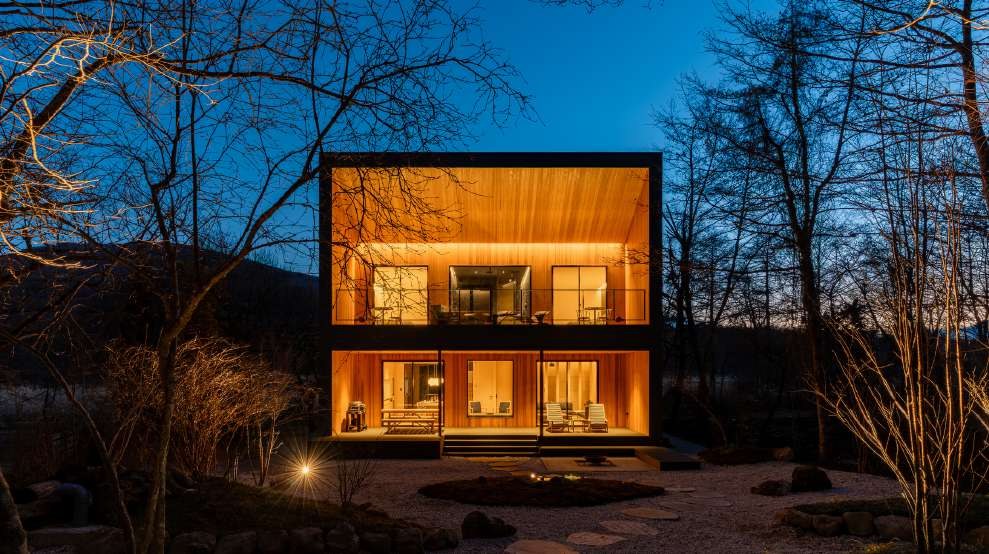Photography sample: two-storey exterior lit up at dusk