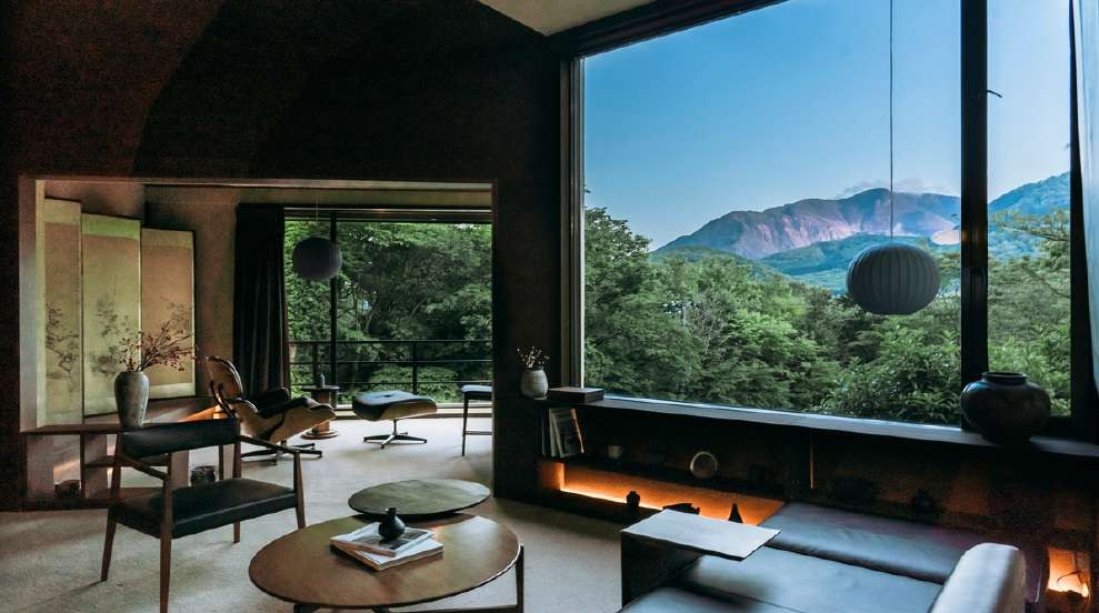 Photography sample: living room with a large window and mountain view